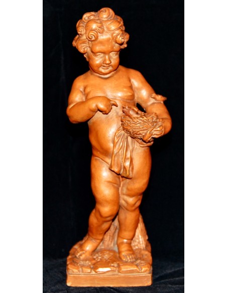 Putto jugando con aves, terracota de principio del siglo XX.