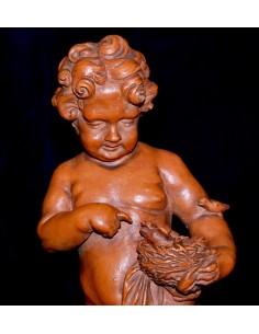 Putto jugando con aves, terracota de principio del siglo XX. 2