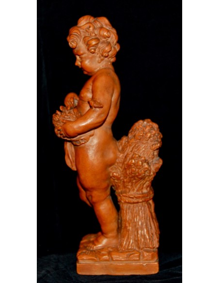 Putto jugando con aves, terracota de principio del siglo XX.