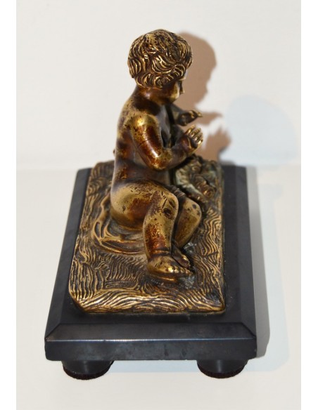Putto, scultura de bronce de finales del siglo XIX.