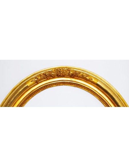 Pareja de marcos ovalados dorados, siglo XIX.