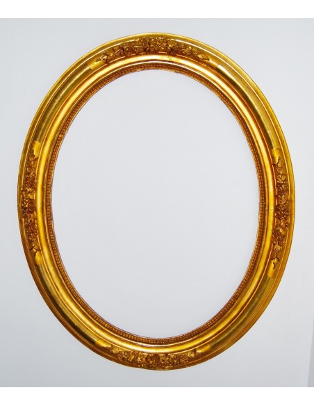 Pareja de marcos ovalados dorados, siglo XIX.