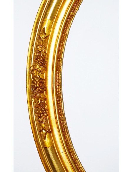 Pareja de marcos ovalados dorados, siglo XIX.