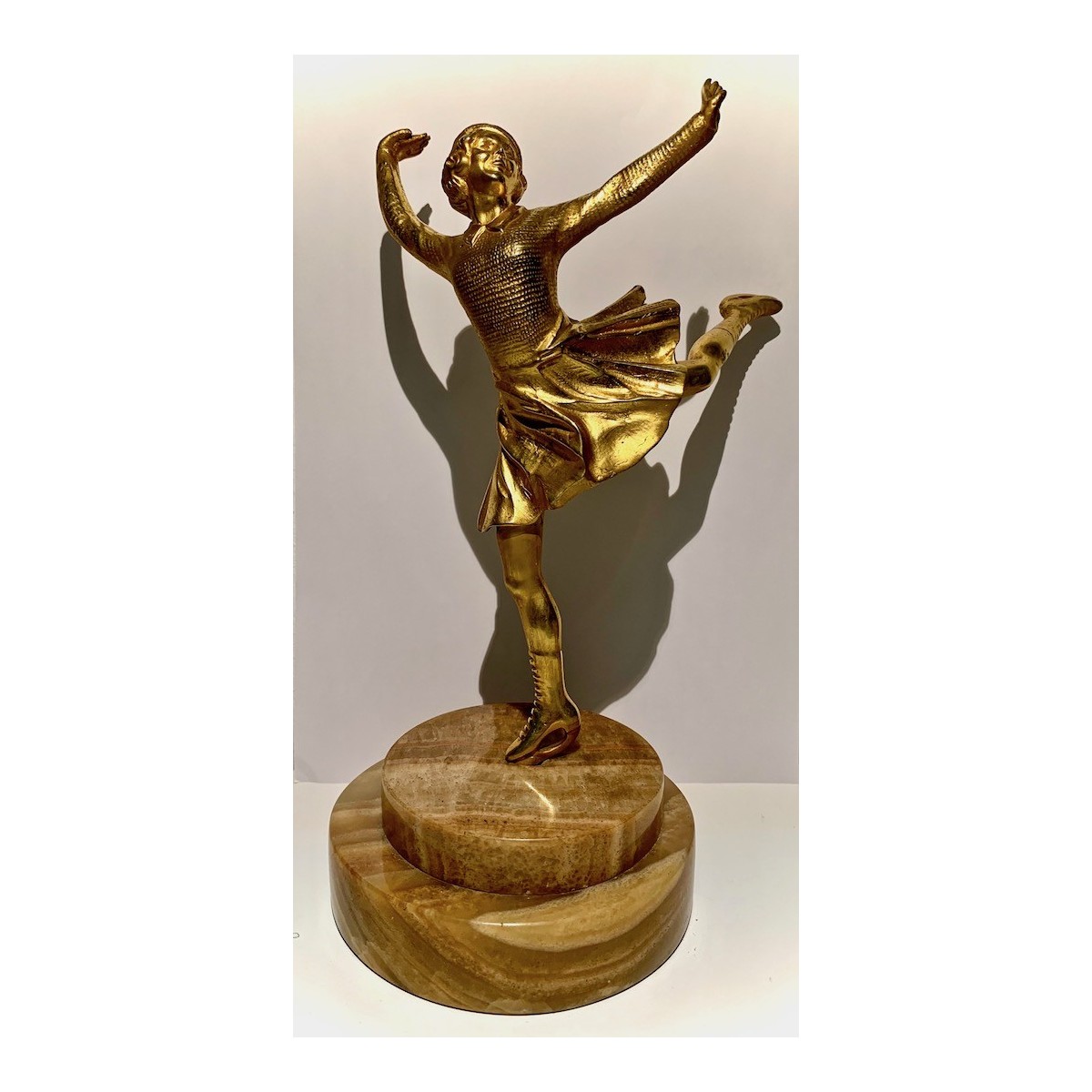 “Pattinatrice su ghiaccio” bronzo dorato