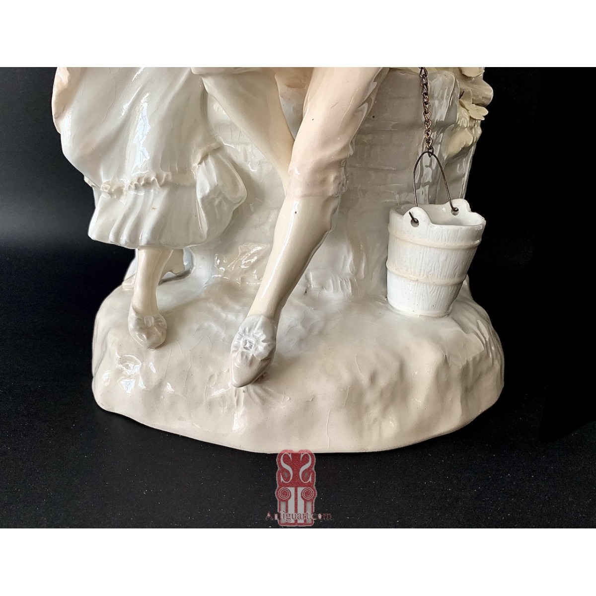 “Pareja de figuras delante al pozo” cerámica principios siglo XX