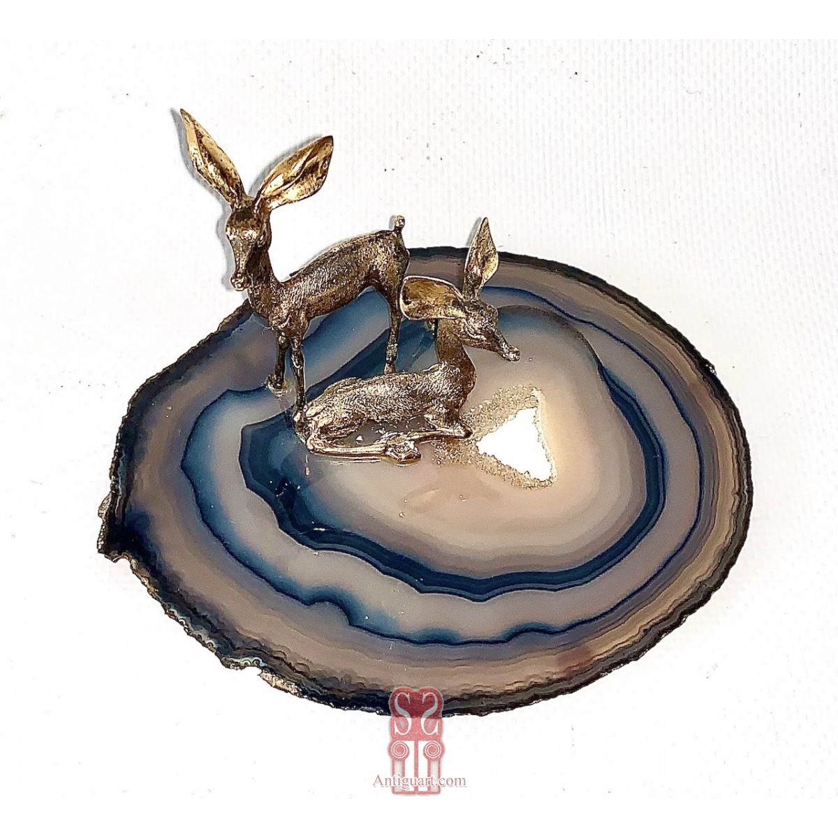 Pareja de ciervos de plata 800 dorada.