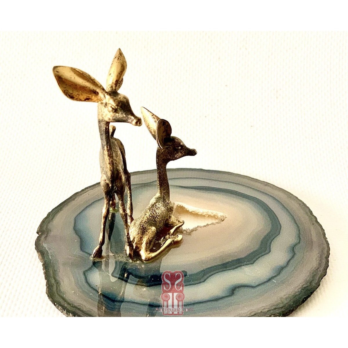 Pareja de ciervos de plata 800 dorada.