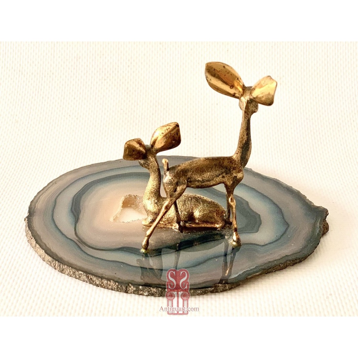 Pareja de ciervos de plata 800 dorada.