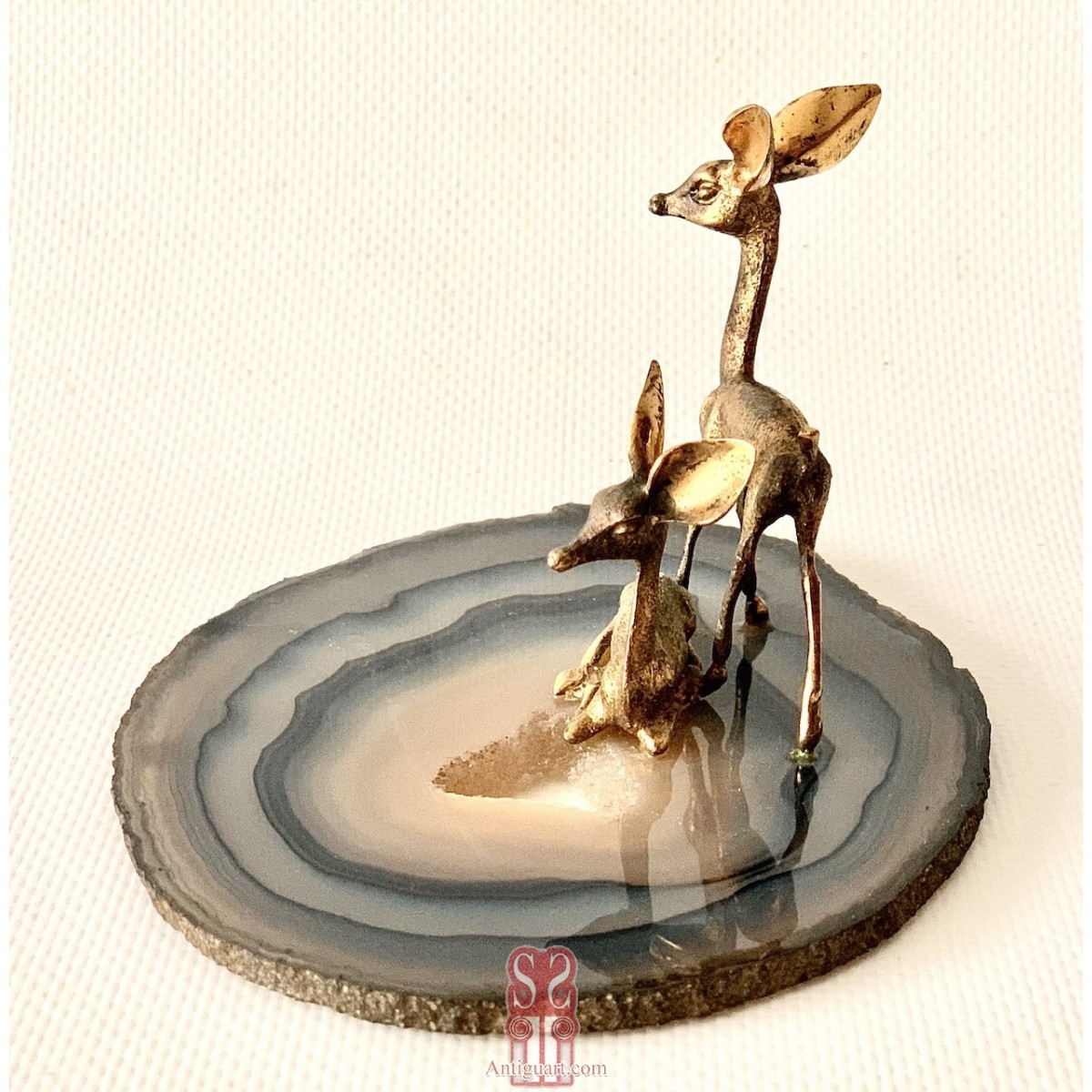 Pareja de ciervos de plata 800 dorada.