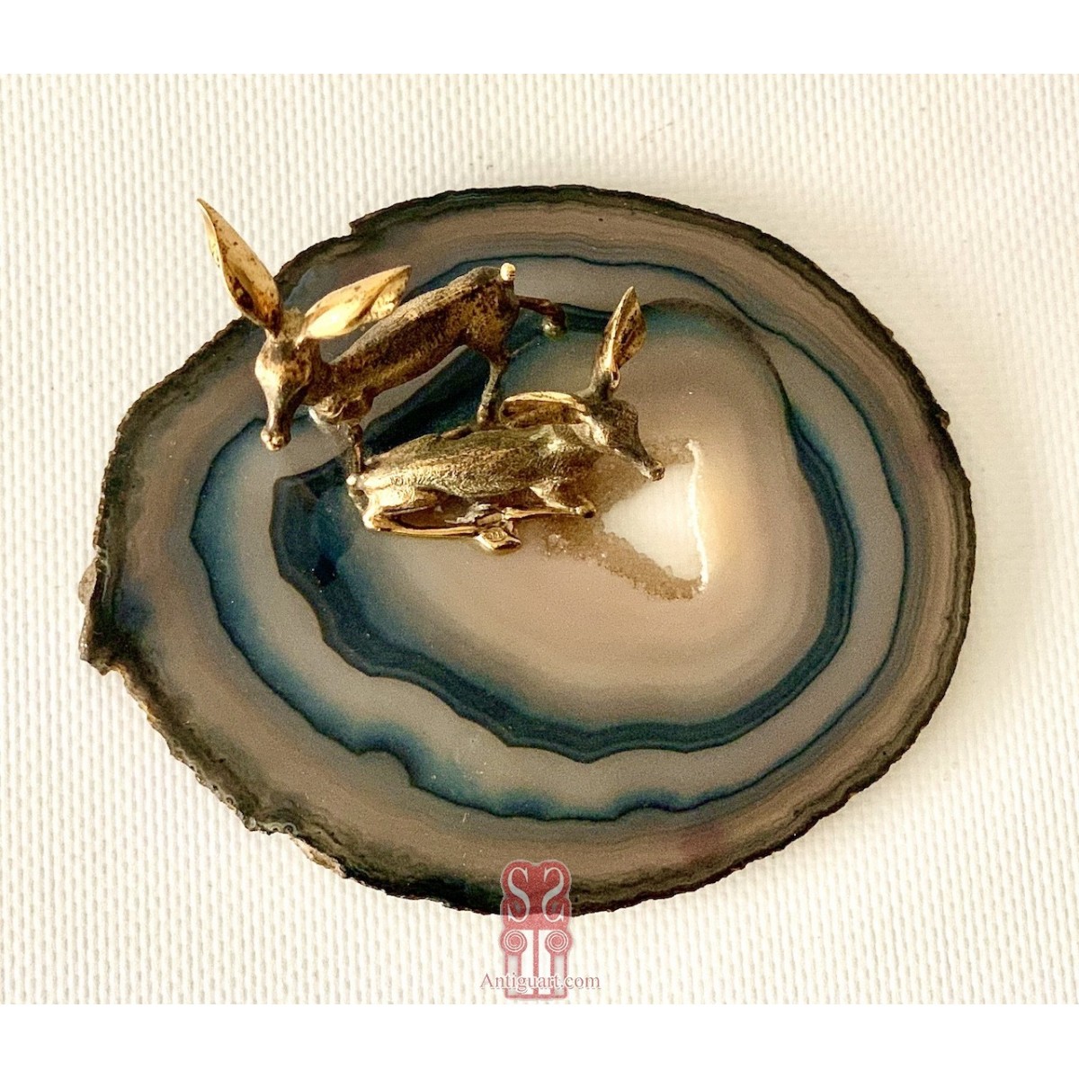 Pareja de ciervos de plata 800 dorada.