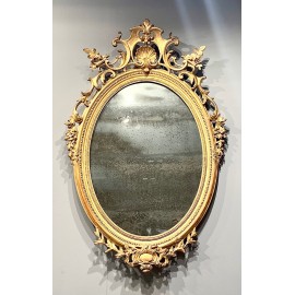 19th century oval gilded mirror