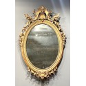 Espejo ovalado del siglo XIX.