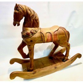 Large rocking toy horse, carved in pine wood and polychrome. Early 20th century.
