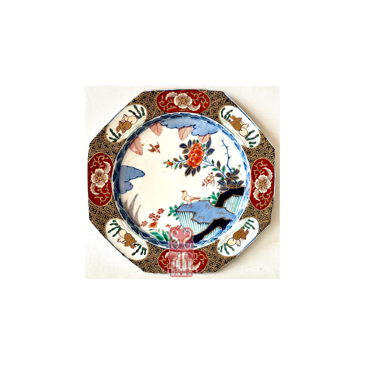 Pareja de platos Imari, Japón finales Siglo XIX.