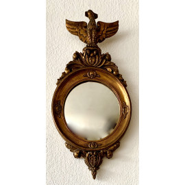 Convex mirror in carved and gilded wood early 20th