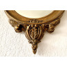 Convex mirror in carved and gilded wood early 20th