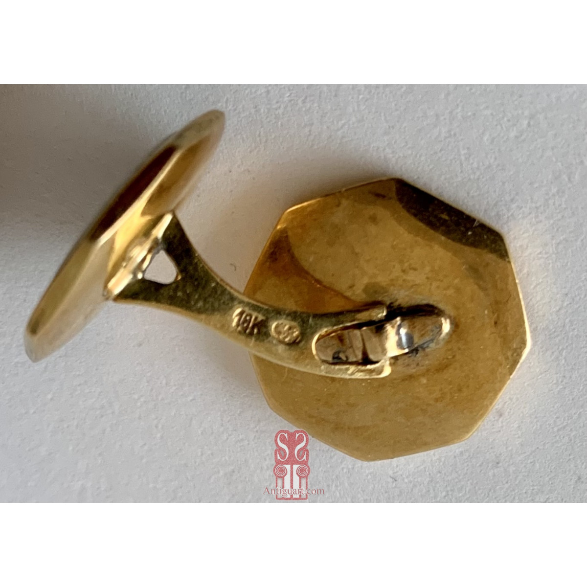 Pareja de gemelos de oro de 18K