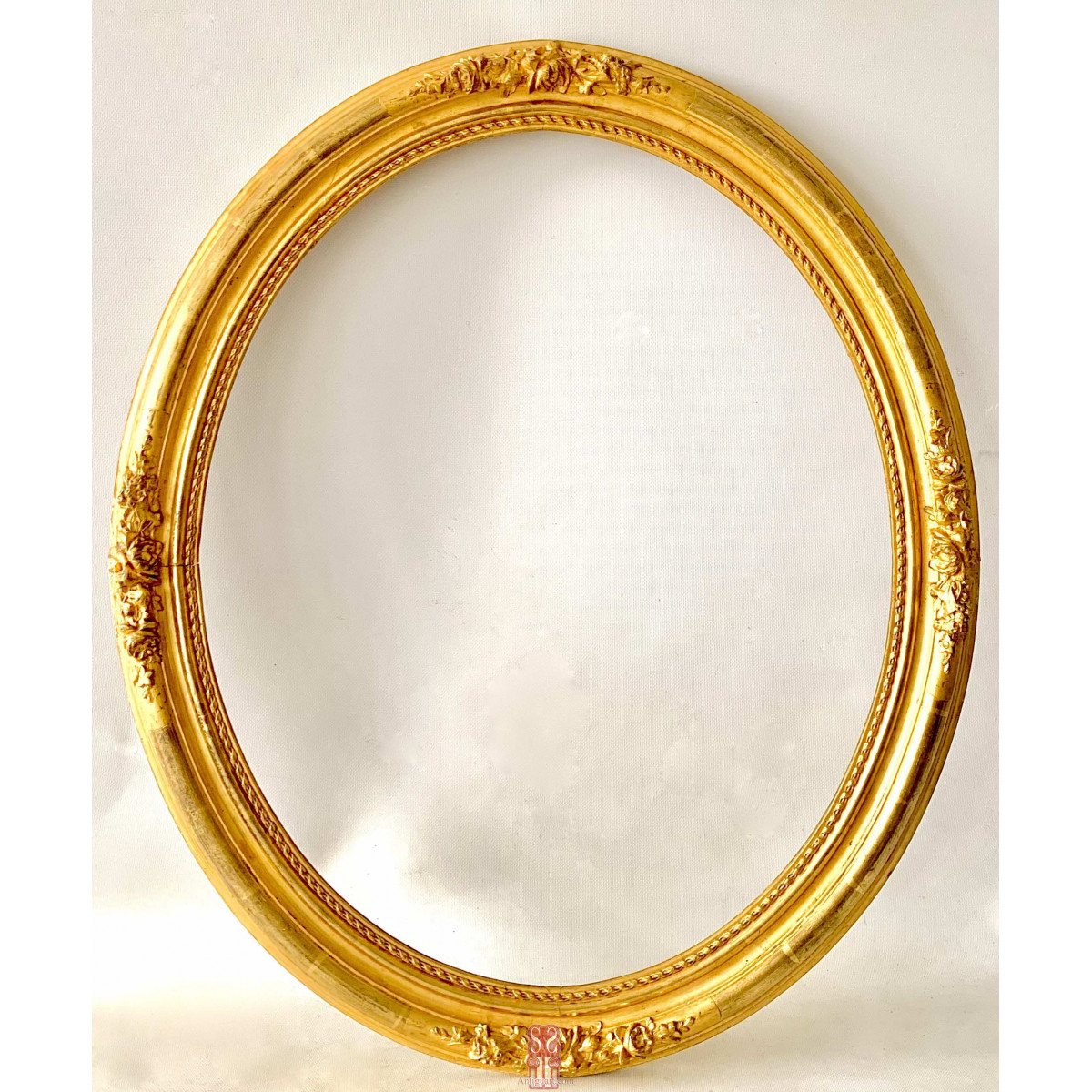 Golden oval frame, 19th