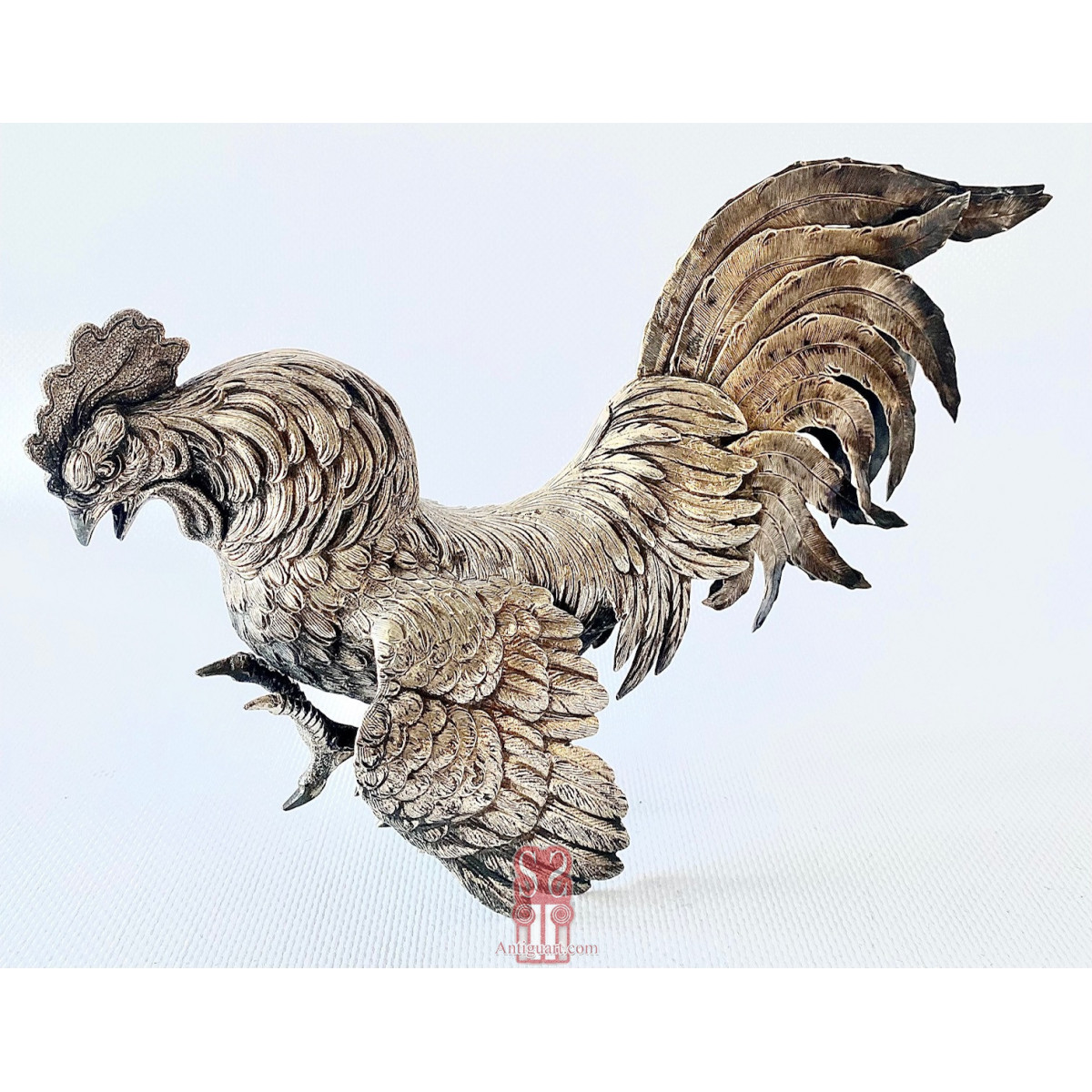 Pareja de  “Coqs” gallos de pelea en plata de ley, España Siglo XX.