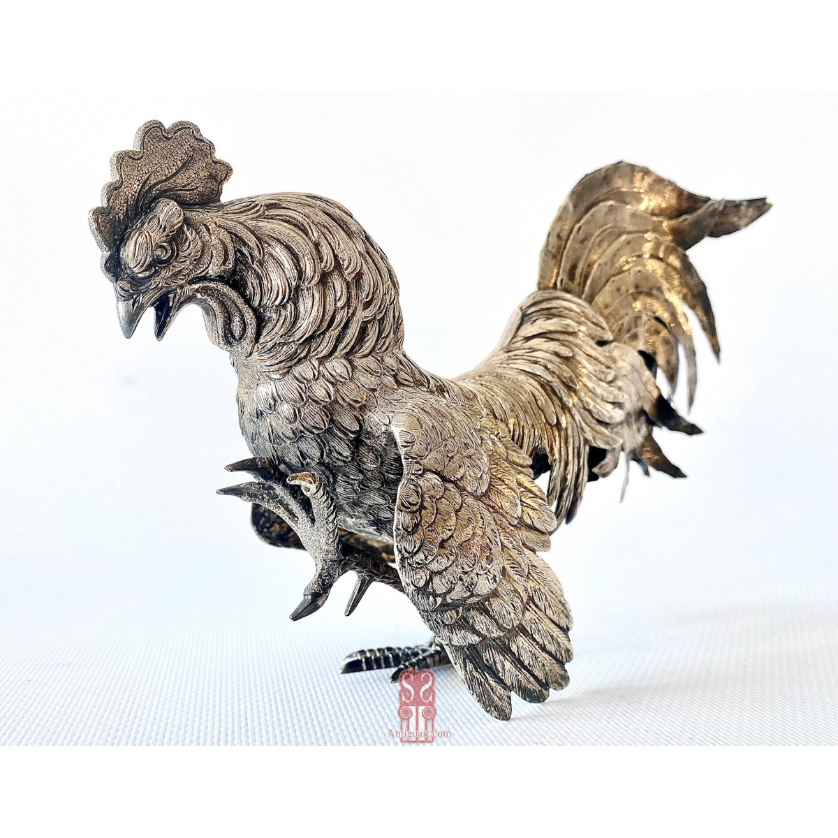 Pareja de  “Coqs” gallos de pelea en plata de ley, España Siglo XX.