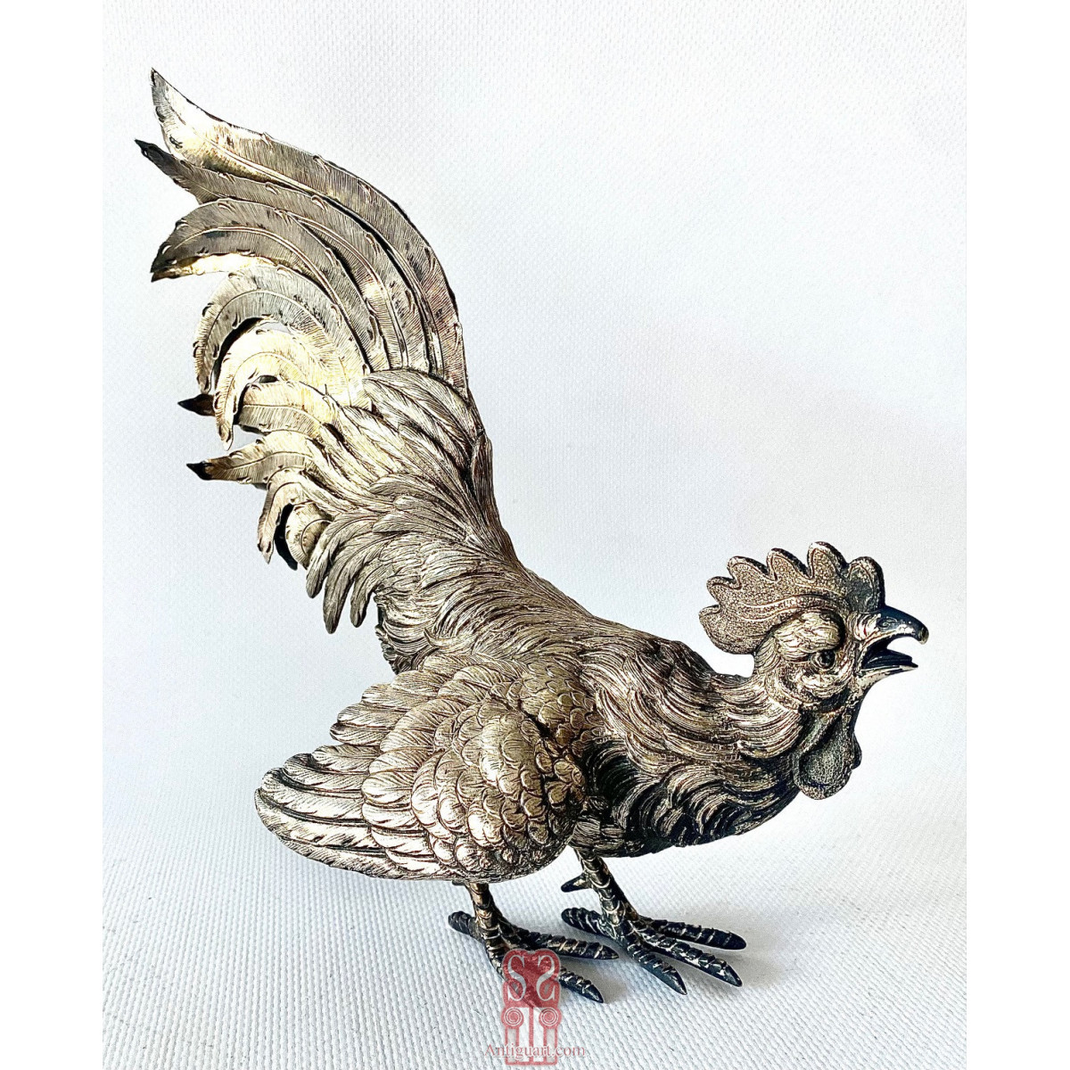 Pareja de  “Coqs” gallos de pelea en plata de ley, España Siglo XX.