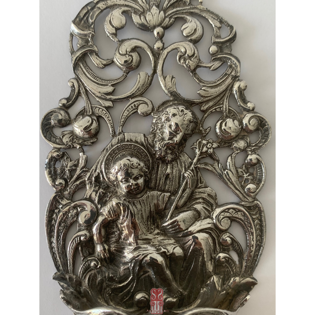 Benditera de plata, San José con el Niño. Finales del Siglo XIX.