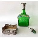 Botella licorera de cristal verde y plata de ley. 1895 contrastes de Londres.