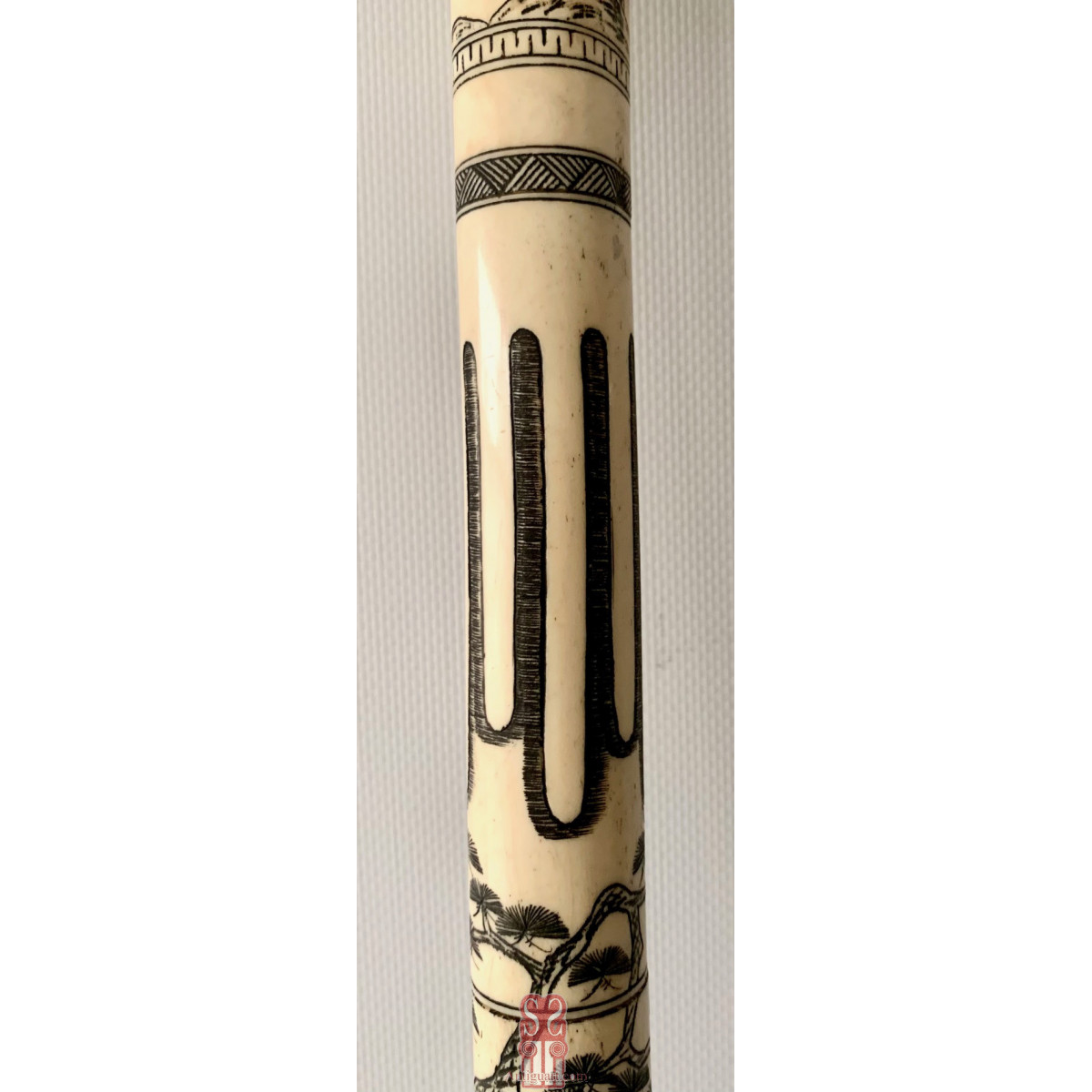 Bastón de paseo, hueso grabado. Japón, primera mitad Siglo XX. 