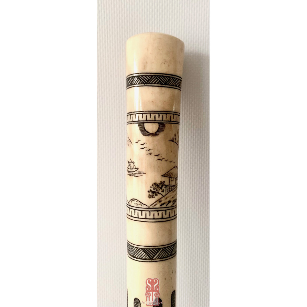 Bastón de paseo, hueso grabado. Japón, primera mitad Siglo XX. 