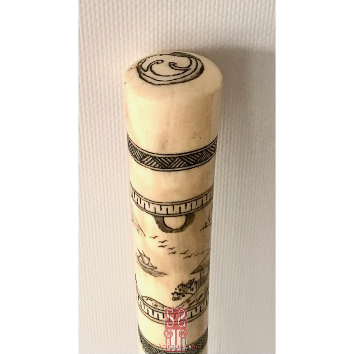 Bastón de paseo, hueso grabado. Japón, primera mitad Siglo XX. 
