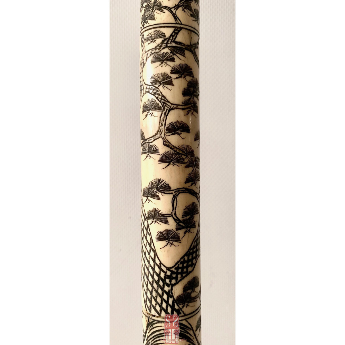 Bastón de paseo, hueso grabado. Japón, primera mitad Siglo XX. 