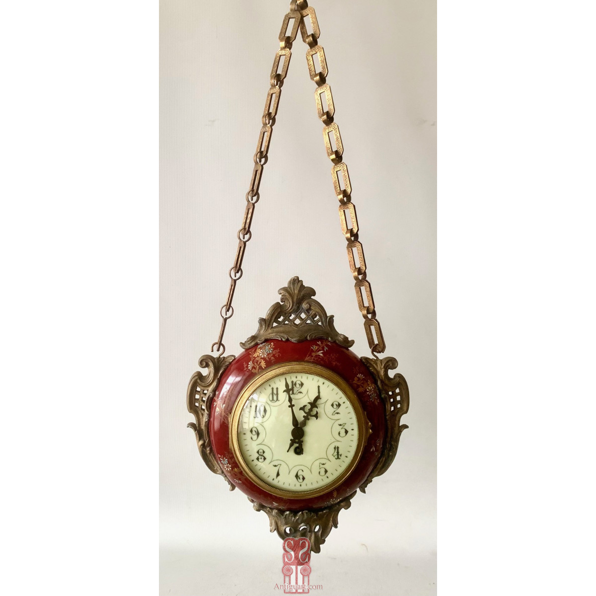 Reloj colgante de doble esfera de principios del Siglo XX.