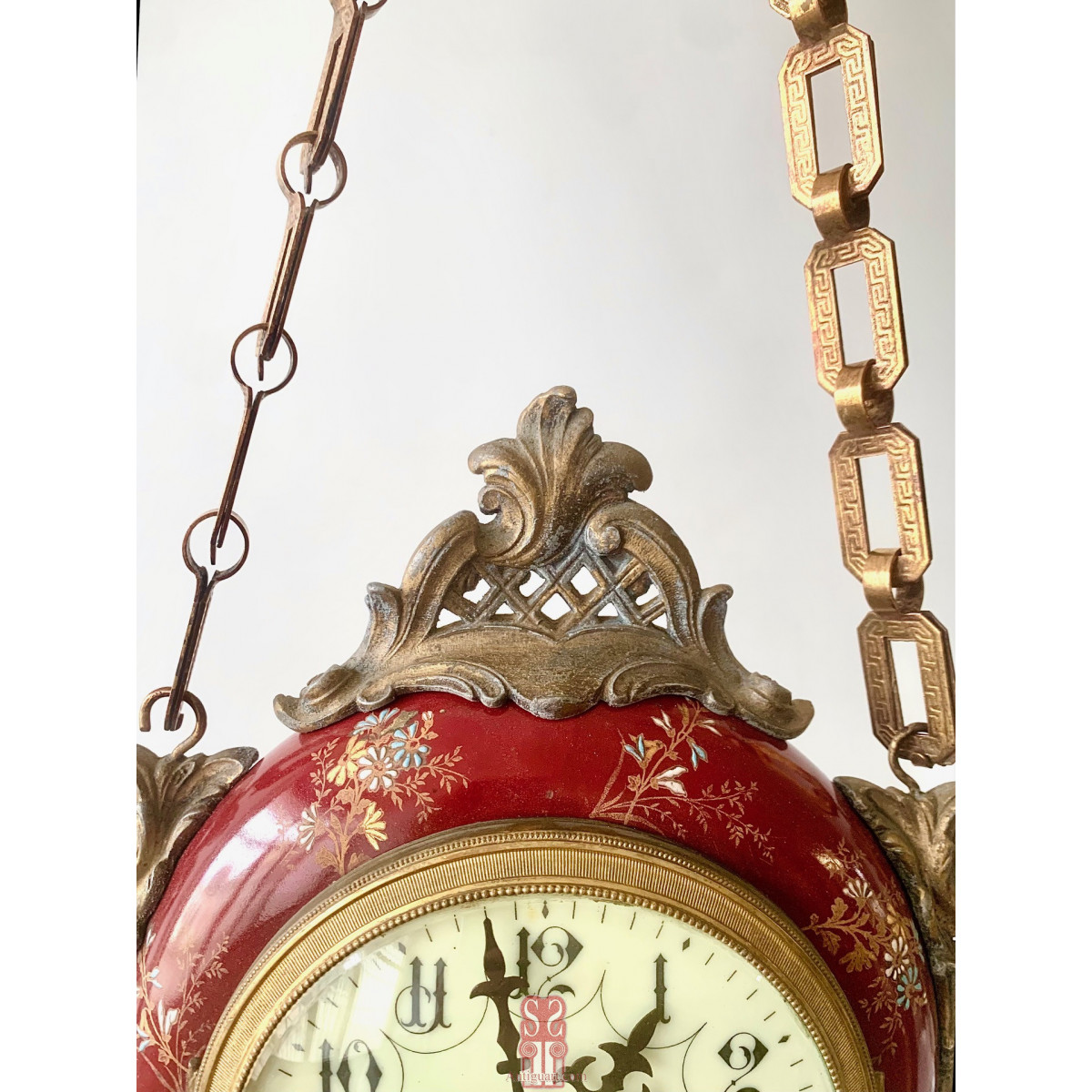 Reloj colgante de doble esfera de principios del Siglo XX.