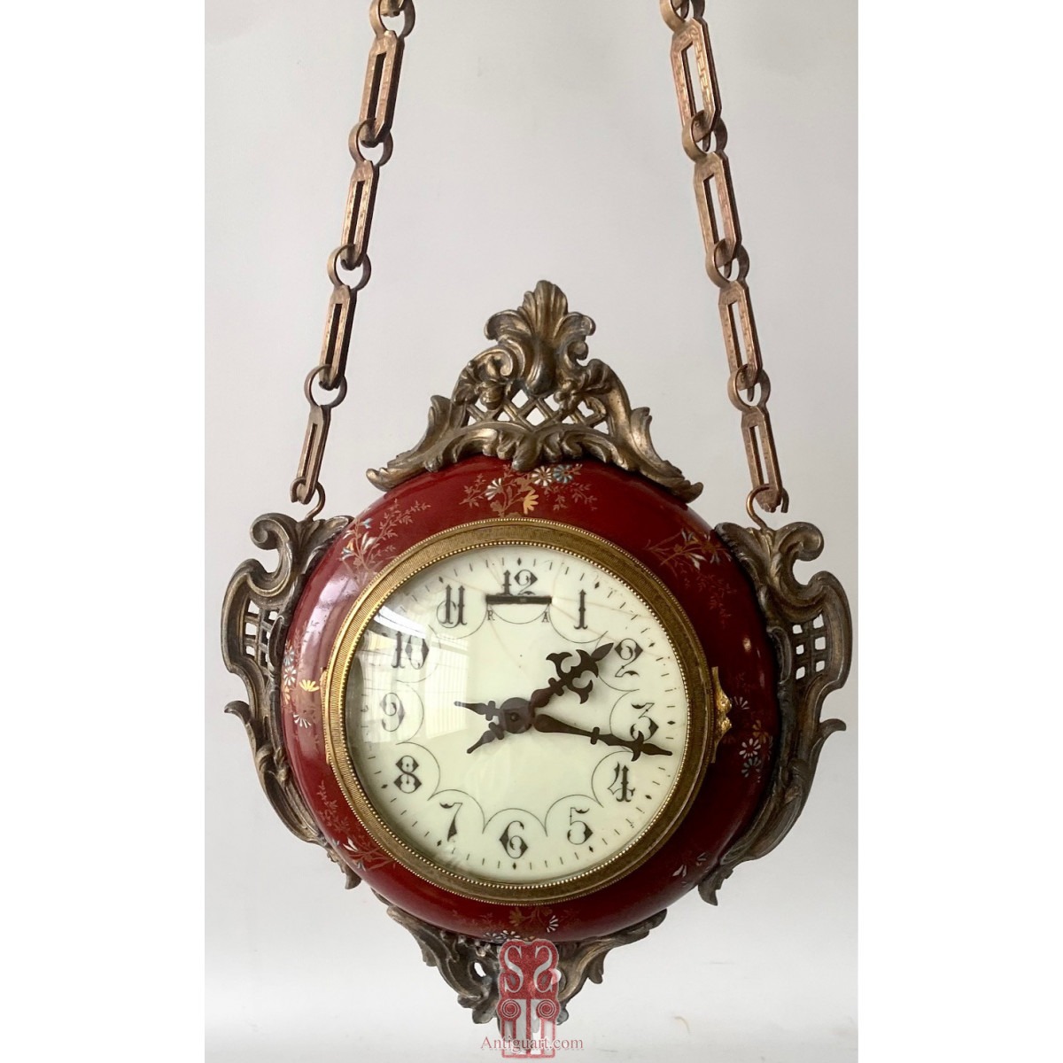 Reloj colgante de doble esfera de principios del Siglo XX.