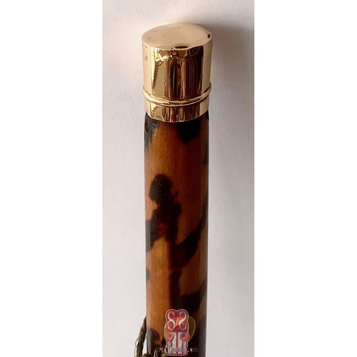 Walking stick tortoiseshell and 14K gold handle.