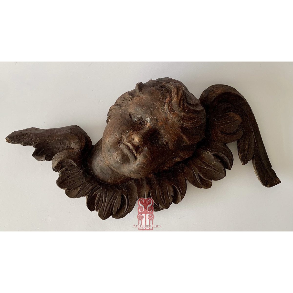 Pareja de cabezas de ángeles, tallas del siglo XVII.