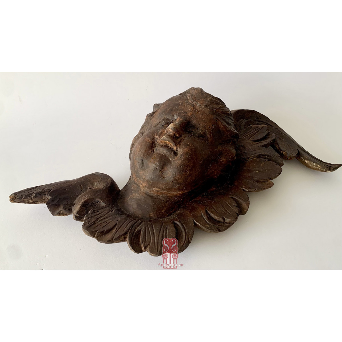 Pareja de cabezas de ángeles, tallas del siglo XVII.