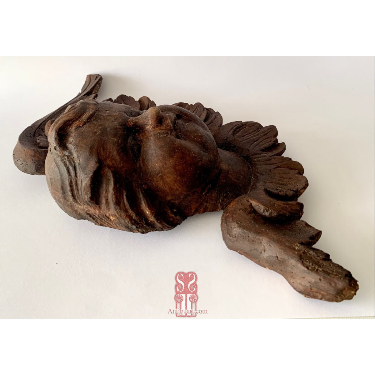 Pareja de cabezas de ángeles, tallas del siglo XVII.