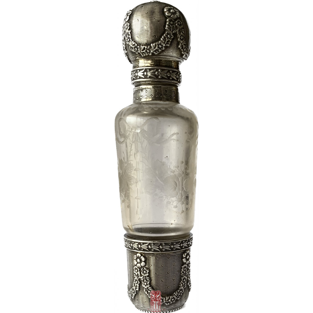 Glass and silver travel liqueur bottle, France, mid-19th.