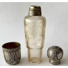 Glass and silver travel liqueur bottle, France, mid-19th.