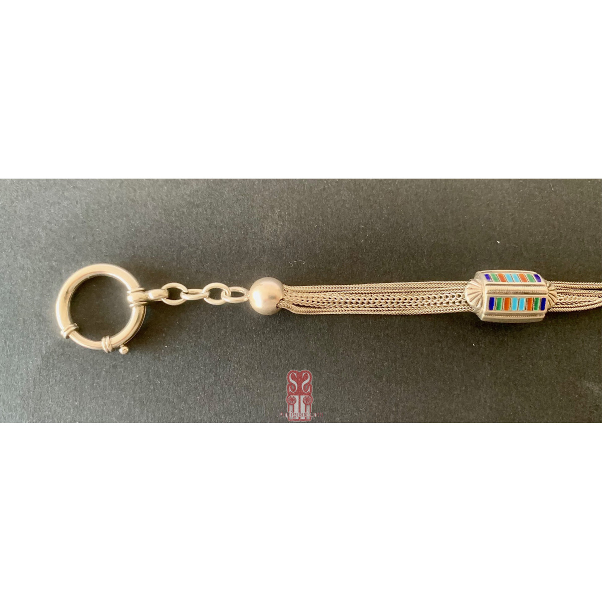 Leontina de plata de ley y esmaltes (1900-1920)