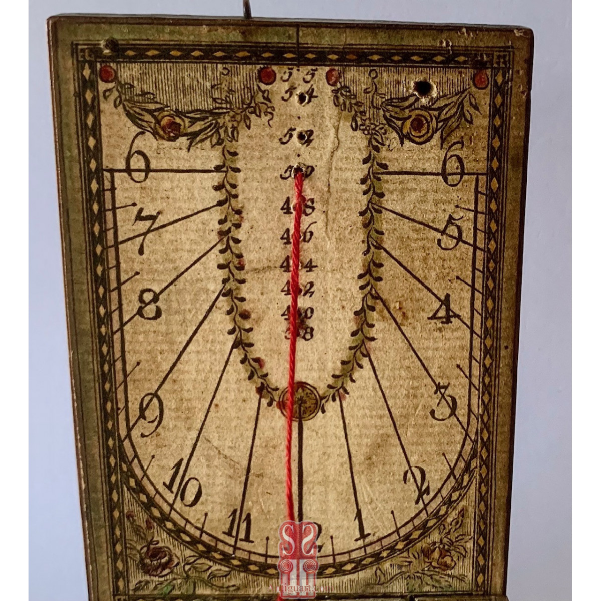 Reloj solar y brújula meridiana del siglo XVIII.