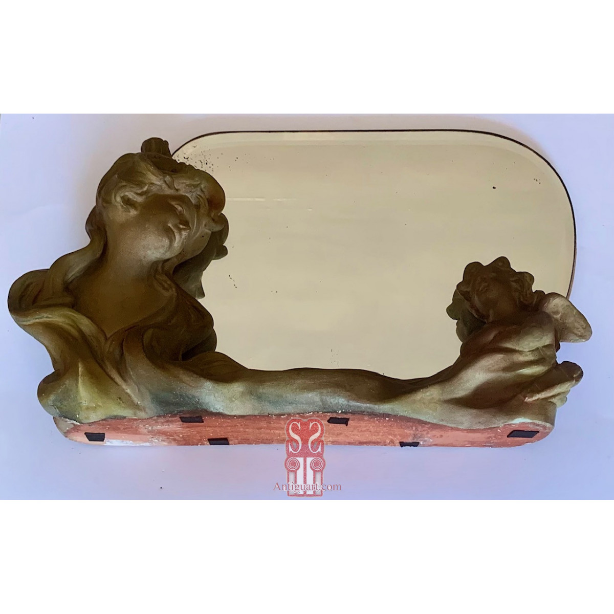 Espejo de mesa modernista de escayola policromada.