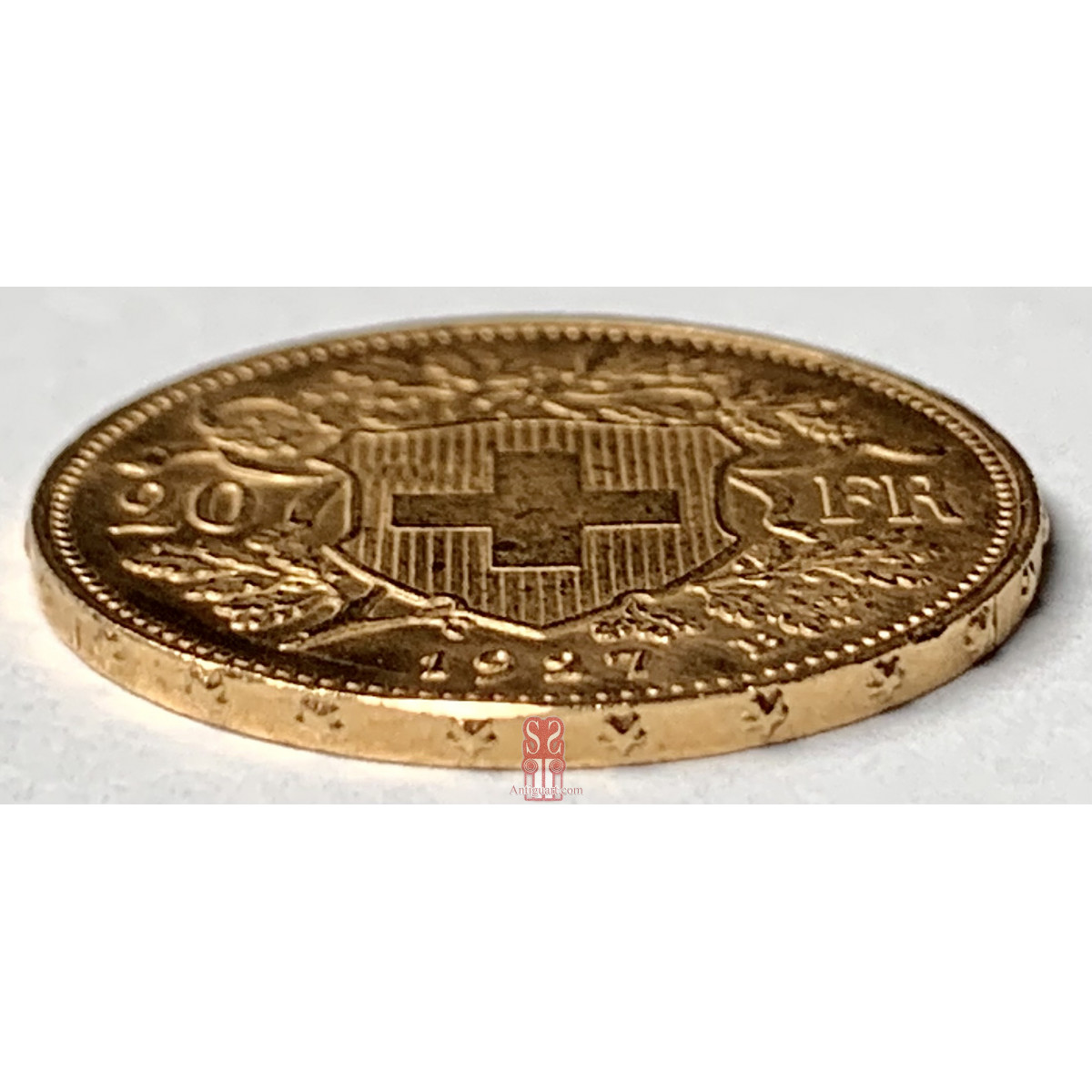 Moneta d'oro svizzera di 20 franchi del 1927, 22 K.
