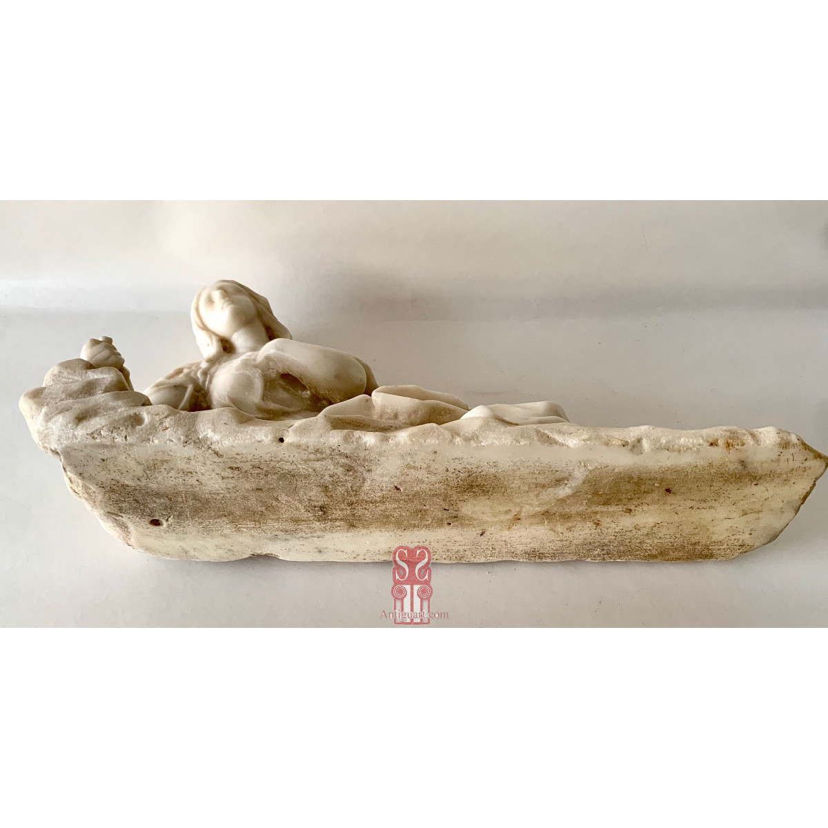 Magdalena penitente,  mármol blanco del siglo XVIII.