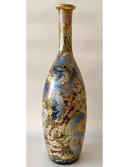 Art Nouveau glass bottle, decorated with decorative bird motifs enameled