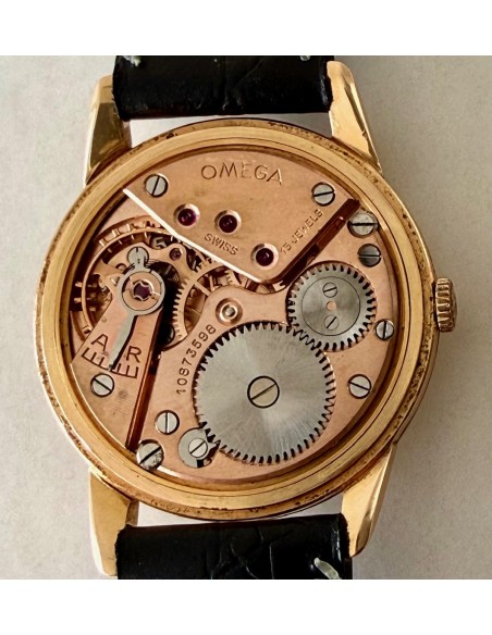 Orologio Omega d'oro 18 carati da uomo, carica manuale in vendita