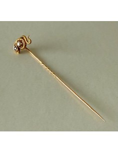 18-karat gold brooch with a snake.