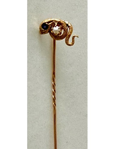 18-karat gold brooch with a snake.
