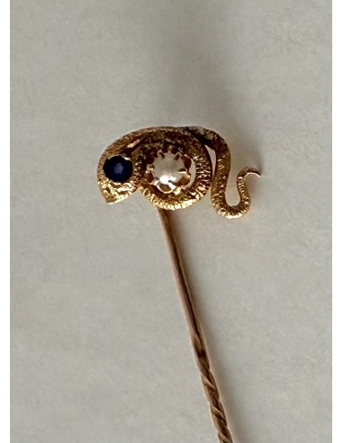 18-karat gold brooch with a snake.